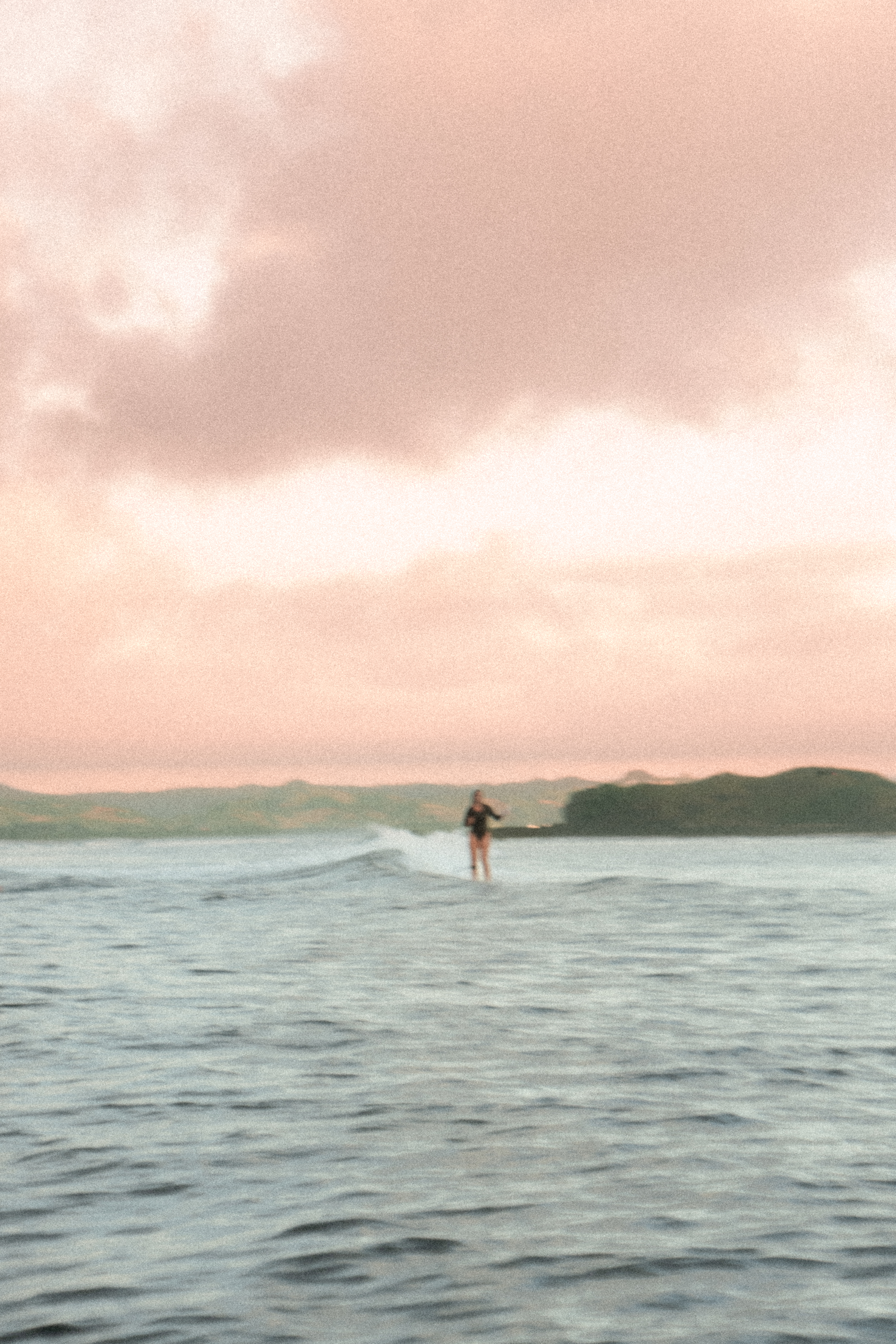 Surf camp retreat photography — ocean waves and surfer lifestyle